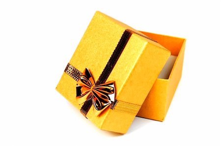 simsearch:400-04291488,k - Opened gold shining gift box isolated on white. Stock Photo - Budget Royalty-Free & Subscription, Code: 400-03946629