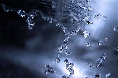 simsearch:622-06900255,k - Close up shot of splashing water Foto de stock - Super Valor sin royalties y Suscripción, Código: 400-03946825