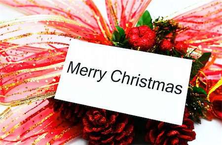 white card with red ribbon and christmas decor background Stock Photo - Budget Royalty-Free & Subscription, Code: 400-03947196