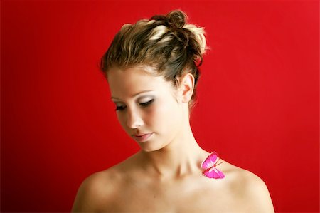 beauty portrait of a beautiful young woman with a butterfly on her shoulder Foto de stock - Super Valor sin royalties y Suscripción, Código: 400-03947237