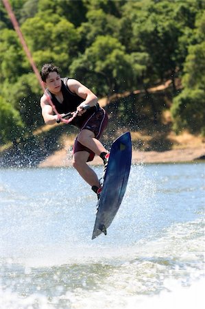 Young wakeboarder jumping Stock Photo - Budget Royalty-Free & Subscription, Code: 400-03947553