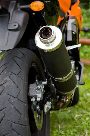 simsearch:400-06858746,k - Close up of the rear wheel of a motorcycle Stock Photo - Budget Royalty-Free & Subscription, Code: 400-03947819