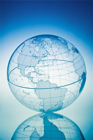 simsearch:400-08048154,k - Blue globe with backlit light Photographie de stock - Aubaine LD & Abonnement, Code: 400-03947986