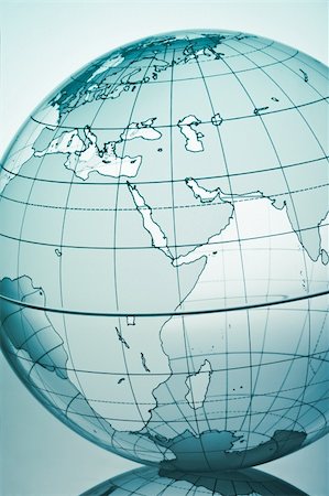 simsearch:400-08048154,k - Blue globe with backlit light Photographie de stock - Aubaine LD & Abonnement, Code: 400-03947991