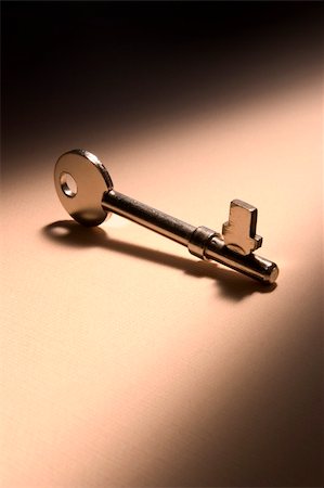 simsearch:614-05819004,k - House key with shadow on textured background Stock Photo - Budget Royalty-Free & Subscription, Code: 400-03948202