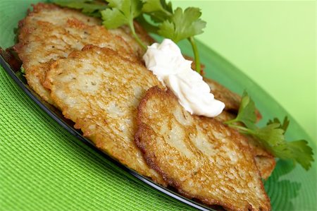 simsearch:400-06066801,k - Potato Pancakes with sour cream Stock Photo - Budget Royalty-Free & Subscription, Code: 400-03948370