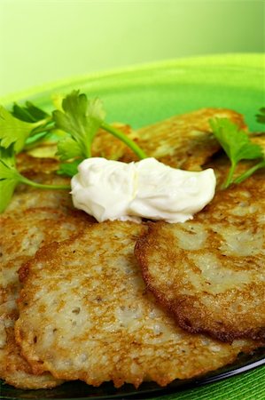 simsearch:400-06066801,k - Potato Pancakes with sour cream Stock Photo - Budget Royalty-Free & Subscription, Code: 400-03948371