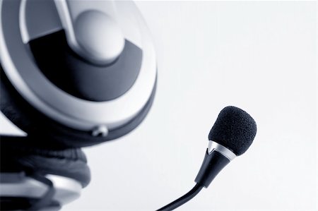 Headphones with microphone on white background Fotografie stock - Microstock e Abbonamento, Codice: 400-03948483
