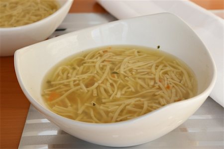 Chicken Noodle Soup in bowl Photographie de stock - Aubaine LD & Abonnement, Code: 400-03948496