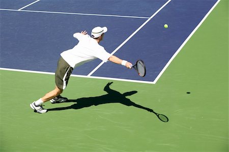 simsearch:400-08755898,k - Young man playing professional tennis Stock Photo - Budget Royalty-Free & Subscription, Code: 400-03948589
