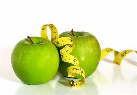 simsearch:400-03990146,k - Two green apples and a tape as concept of healthy lifestyle Foto de stock - Royalty-Free Super Valor e Assinatura, Número: 400-03948766