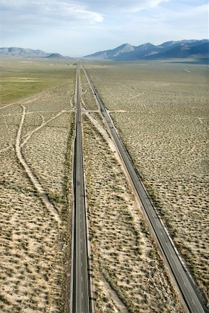 simsearch:400-03948660,k - Aerial of desolate scenic highway through rural desert landscape of California, USA. Stock Photo - Budget Royalty-Free & Subscription, Code: 400-03948795