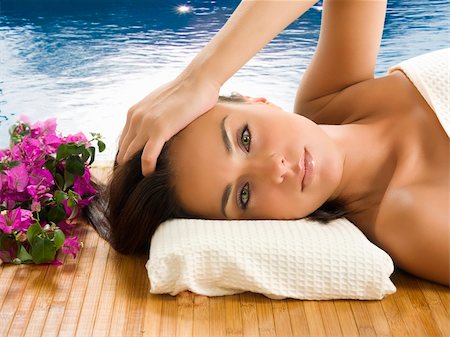 simsearch:400-03948949,k - very cute brunette with wonderful eyes laying down on a carpet near a swiming pool Foto de stock - Royalty-Free Super Valor e Assinatura, Número: 400-03948976