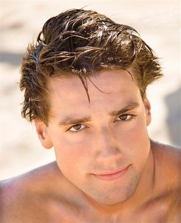 simsearch:400-03940673,k - Head and shoulder portrait of handsome man on beach. Stock Photo - Budget Royalty-Free & Subscription, Code: 400-03949088