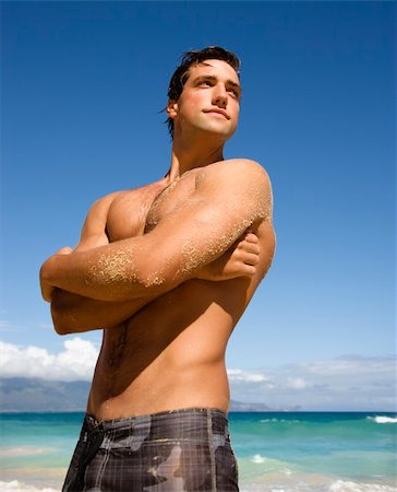 simsearch:400-03940673,k - Handsome man standing on Maui, Hawaii beach. Stock Photo - Budget Royalty-Free & Subscription, Code: 400-03949083