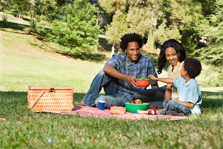 family picnic african american - Smiling happy parents and son having picnic in park. Stock Photo - Budget Royalty-Free & Subscription, Code: 400-03949275