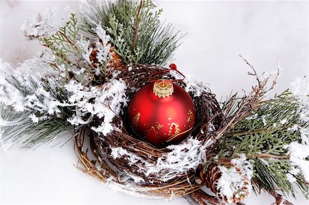 simsearch:400-03965193,k - Red ornament in nest and snow Stock Photo - Budget Royalty-Free & Subscription, Code: 400-03949507