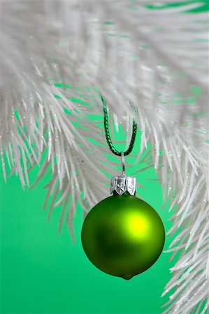 round ornament hanging of a tree - Christmas Ornament hanging on a tree branch. Stock Photo - Budget Royalty-Free & Subscription, Code: 400-03949518