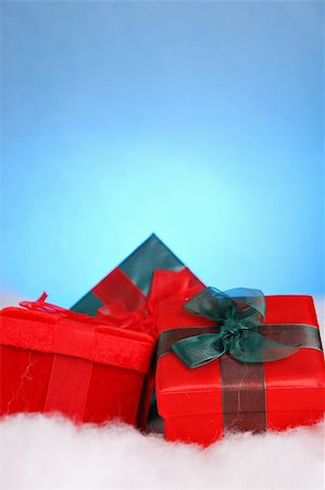 simsearch:632-06118319,k - Christmas gifts on white snow and blue background Stock Photo - Budget Royalty-Free & Subscription, Code: 400-03949626