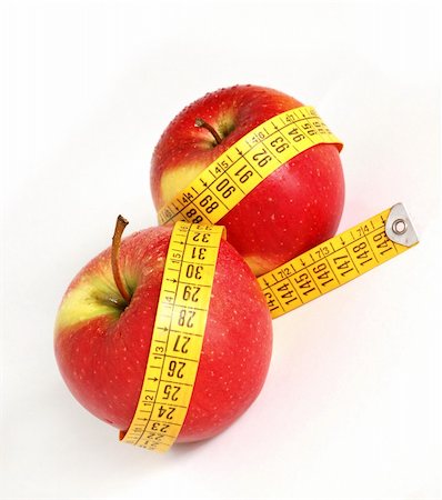 simsearch:400-04564052,k - Red apples and tape as a concept of healthy lifestyle Foto de stock - Super Valor sin royalties y Suscripción, Código: 400-03949631