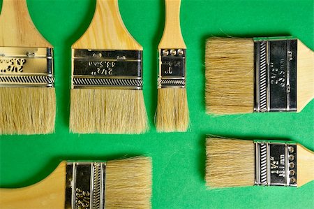 simsearch:400-03914127,k - Flat brushes on green Stockbilder - Microstock & Abonnement, Bildnummer: 400-03949658