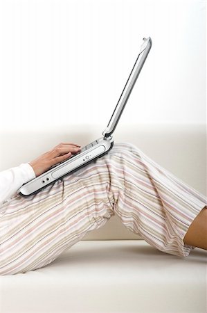 simsearch:400-04017977,k - Beautiful woman working at home with her laptop Photographie de stock - Aubaine LD & Abonnement, Code: 400-03949727