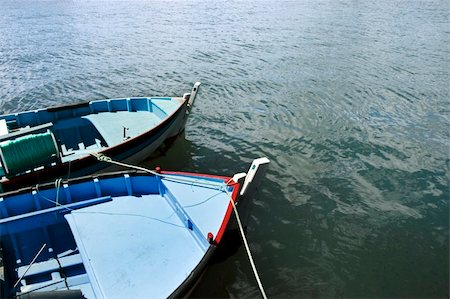 Couple of small fishing rowboats moored Stock Photo - Budget Royalty-Free & Subscription, Code: 400-03949845