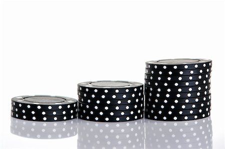 simsearch:670-06451367,k - Poker noir des puces dans une ligne Photographie de stock - Aubaine LD & Abonnement, Code: 400-03949872