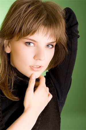 simsearch:400-04780842,k - a pretty girl in a black sweater Stock Photo - Budget Royalty-Free & Subscription, Code: 400-03940141