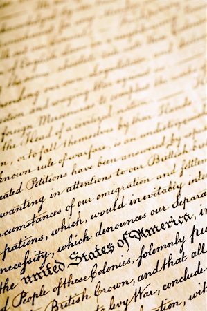 sascha (artist) - declaration of Independence, background with United States of America in foreground, angled macro with limited depth of field Fotografie stock - Microstock e Abbonamento, Codice: 400-03940239