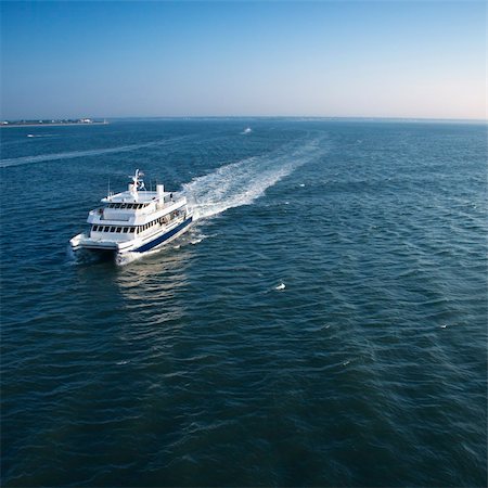 simsearch:400-04468744,k - Aerial view of passenger ferry boat in open waters near Bald Head Island, North Carolina. Stock Photo - Budget Royalty-Free & Subscription, Code: 400-03940584