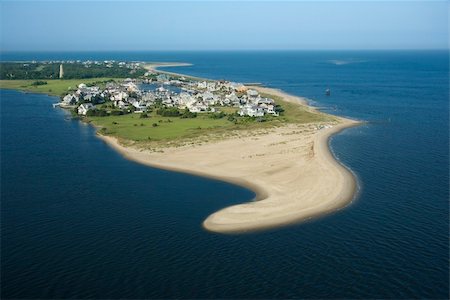 simsearch:400-03940589,k - Aerial view of beach and residential community on Bald Head Island, North Carolina. Foto de stock - Super Valor sin royalties y Suscripción, Código: 400-03940594