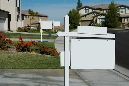 Blank Real Estate Signs in a Row - Ready for your own message. Stock Photo - Budget Royalty-Free & Subscription, Code: 400-03940766