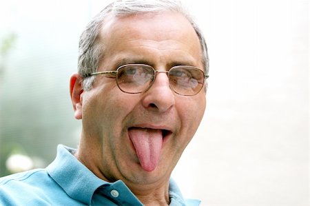 funny old men crazy - Mature man with his tongue out Stock Photo - Budget Royalty-Free & Subscription, Code: 400-03940790