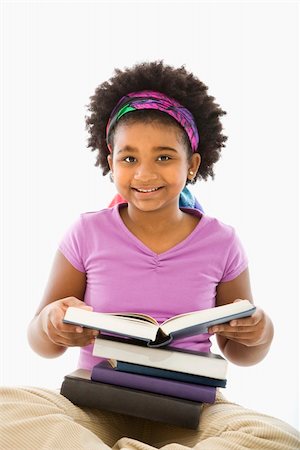 simsearch:400-03923096,k - African American girl with large stack of books smiling at viewer. Stock Photo - Budget Royalty-Free & Subscription, Code: 400-03940988