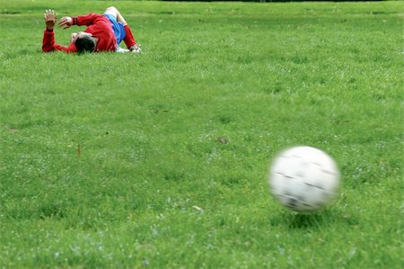 simsearch:400-06513403,k - Injured player on the soccer field Stock Photo - Budget Royalty-Free & Subscription, Code: 400-03941073