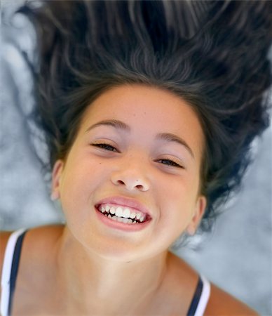 simsearch:400-03925541,k - Happy girl with her hair up Stock Photo - Budget Royalty-Free & Subscription, Code: 400-03941309