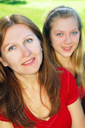 simsearch:400-04612785,k - Portrait of a smiling mother and teenage daughter in summer park Stock Photo - Budget Royalty-Free & Subscription, Code: 400-03941397