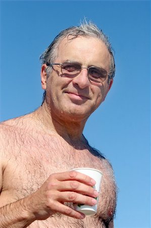 Mature man at the beach Stock Photo - Budget Royalty-Free & Subscription, Code: 400-03941426