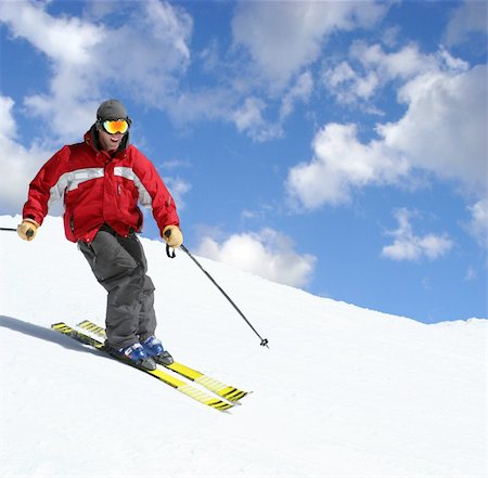 simsearch:400-04811318,k - Skier on a slope against the cloudy sky Stock Photo - Budget Royalty-Free & Subscription, Code: 400-03941855