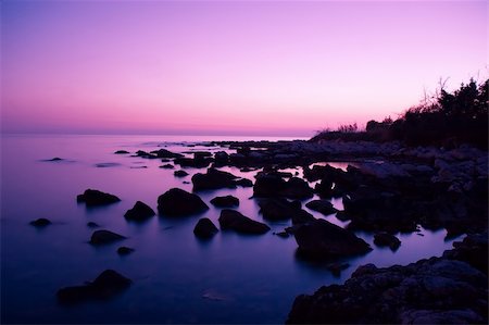 sunset west coast blue sky - Fantastic scene of pink sky reflection at rocky bay Stock Photo - Budget Royalty-Free & Subscription, Code: 400-03942191