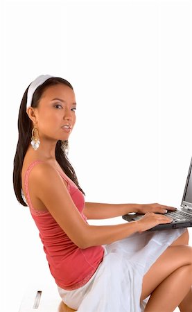 sexual lap - Female student sitting on the desk with laptop on her lap Stock Photo - Budget Royalty-Free & Subscription, Code: 400-03942262