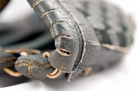 Softball Glove with focus on webbing Stock Photo - Budget Royalty-Free & Subscription, Code: 400-03942372