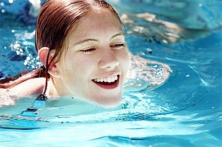 Happy girl in a pool Stock Photo - Budget Royalty-Free & Subscription, Code: 400-03942510