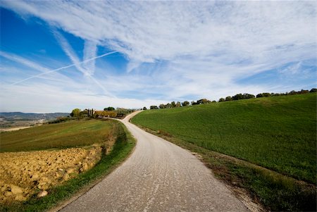 One road bend through the umbrian countryiside, Umbria, Italy Stockbilder - Microstock & Abonnement, Bildnummer: 400-03942830