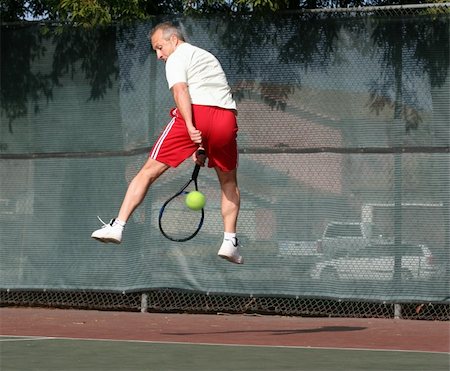 simsearch:400-08755898,k - Middleage man playing tennis Stock Photo - Budget Royalty-Free & Subscription, Code: 400-03942853