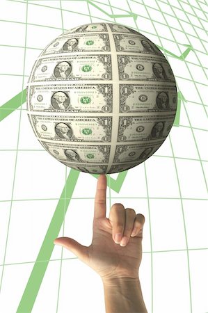 simsearch:693-06021344,k - Financial concept - hand holding spinning money globe with chart background Stockbilder - Microstock & Abonnement, Bildnummer: 400-03942997