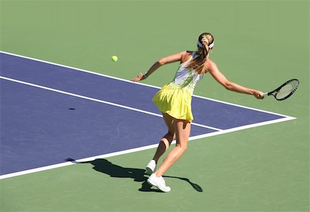 simsearch:400-08755898,k - Woman playing tennis at the professional tournament Stock Photo - Budget Royalty-Free & Subscription, Code: 400-03943591