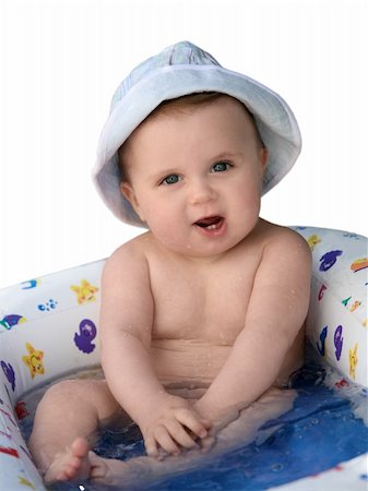 simsearch:400-04986804,k - Cute baby in a hat taking a bath Stockbilder - Microstock & Abonnement, Bildnummer: 400-03943602