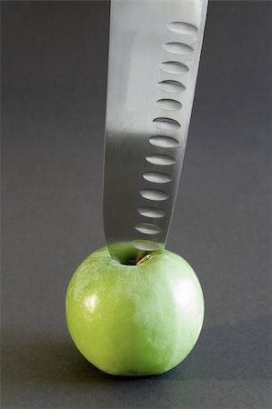 simsearch:695-05770339,k - Kitchen knife and the apple Stock Photo - Budget Royalty-Free & Subscription, Code: 400-03943753